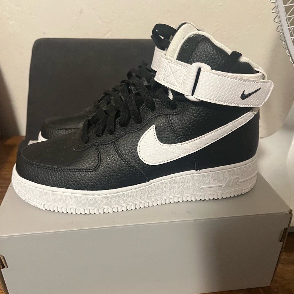 Nike Air Force 1 high tops.